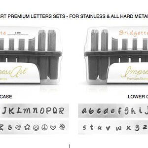 May include: Two sets of metal letter stamps in clear plastic cases. The top case contains uppercase letters, numbers, and symbols. The bottom case contains lowercase letters, numbers, and symbols. The cases are labeled "Impress Art" and "Bridgette".