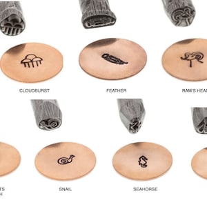 May include: A set of 10 metal stamps for jewelry making, featuring various designs including a cloud, feather, ram's head, deer prints, snail, seahorse, and bumblebee. The stamps are shown on a white background with examples of the designs stamped on copper discs.