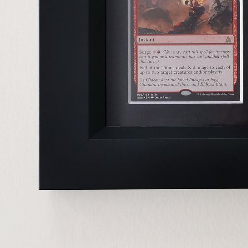 a picture frame with a picture of a dragon on it