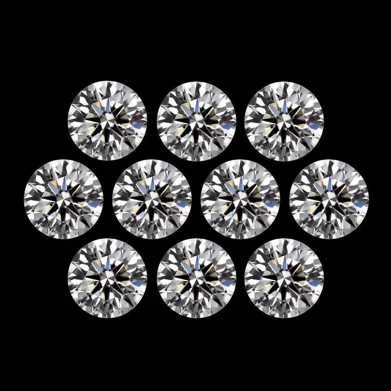 May include: Ten round-cut diamonds are displayed against a black backdrop. Each diamond has multiple facets, reflecting light and creating a sparkling effect. The image highlights the clarity and brilliance of the gemstones, showcasing their quality.