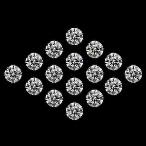 May include: Sixteen round-cut diamonds are arranged in a diamond formation against a black backdrop. The diamonds are clear and sparkling, with multiple facets reflecting light. The gems are brilliant, showcasing their clarity and cut.