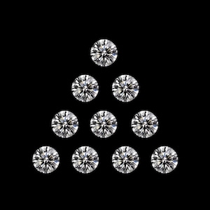 May include: Ten round-cut diamonds arranged in a triangular pattern against a black backdrop. The diamonds are clear and sparkling, reflecting light. The arrangement suggests a jewelry design or a display of gemstones.