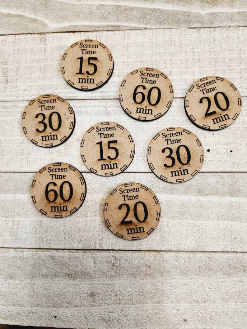 May include: Seven wooden tokens with a brown background and black text. Each token has a different amount of screen time in minutes: 15, 30, 60, and 20.