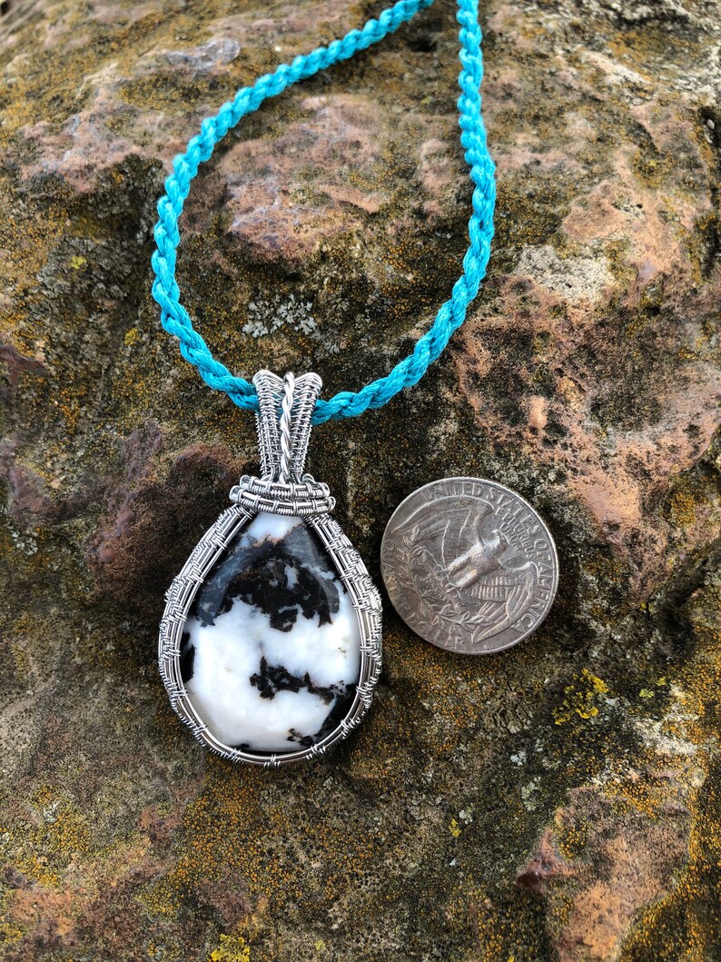 Faceted zebra jasper in stainless steel wire