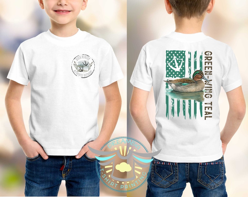 May include: White t-shirt with a green-winged teal duck on an American flag design on the back. The front of the shirt has a small logo that says "Duck Hunter Outfitters".