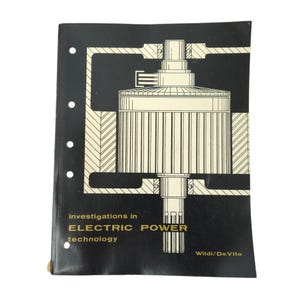May include: A black book with a diagram of an electrical component in white. The book has the title "investigations in ELECTRIC POWER technology" in gold lettering. The author's name, Wildi/De Vito, is in the bottom right corner.