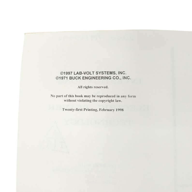 May include: A white book page with black text. The text includes copyright information for Lab-Volt Systems, Inc. and Buck Engineering Co., Inc. It also states "All rights reserved" and mentions the twenty-first printing from February 1998.