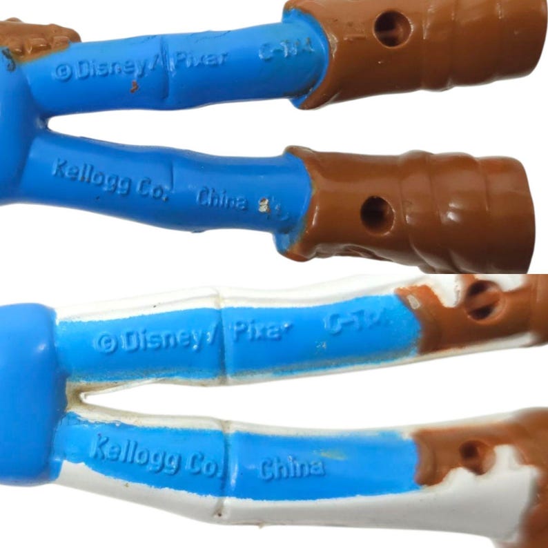 May include: Close-up of three toy parts. The parts are blue and brown, with the text "Disney/Pixar" and "Kellogg Co. China" visible. The brown sections have a hole.