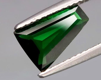 Tsavorite Garnet"natural untreated" VS eye clean top green color precision cut tapered baguette from Tanzania 1.24ct.