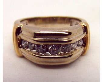 Men's 10kt. white and yellow gold split shank design diamond ring 8 grams with .50cts of diamonds