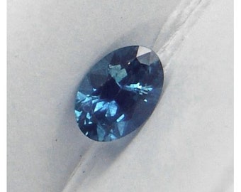 Montana Sapphire Eldorado Bar untreated VVS clean precision oval cut Montana steel blue sapphire .40ct.