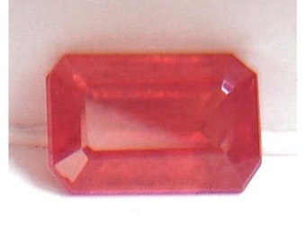 Ceylon "natural heat treated" VS eye clean intense top pinkish orange padparadscha precision emerald cut Sapphire from Sri Lanka 2.56ct.