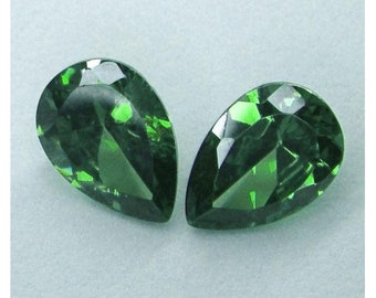 RARE large matched pair of Chrysoberyl"untreated" VVS clean finest intense green color precision cut pear shape gems from Sri Lanka 16.70tcw
