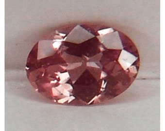 Ceylon NATURAL Untreated VS-VVS intense top padparadscha precision oval cut Sapphire .58ct.