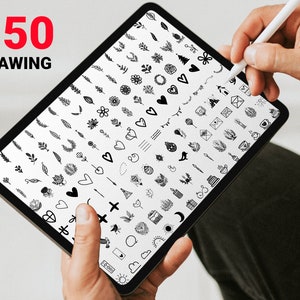 May include: A digital tablet screen displaying 150 black and white hand-drawn illustrations of various shapes, symbols, and designs. The illustrations include hearts, leaves, flowers, stars, and more.
