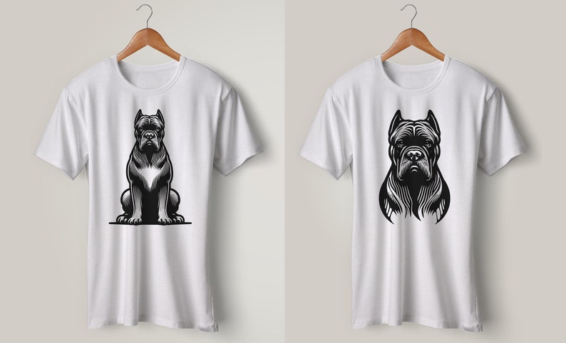 May include: Two white t-shirts with a black and white illustration of a Cane Corso dog. One shirt features the dog sitting, while the other shows the dog's head and shoulders.