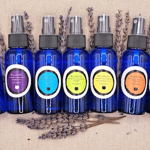 The Seven Chakras Essential Oil Aura Spray Set. Crystal Infused.