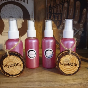 WychOils Floral pink shimmer body spray. Crystal infused Essential oil body spray. Vanilla, Rose, orange and grapefruit body spray.
