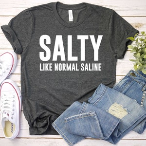 Salty Like Normal Saline T-Shirt School Nurse Shirt Funny Nurse Clothing Beautiful Nursing Student Tee Motivated Nurse Gift Salty Shirt