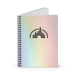 May include: A spiral bound notebook with a holographic rainbow cover featuring a black silhouette of the iconic Disney castle.