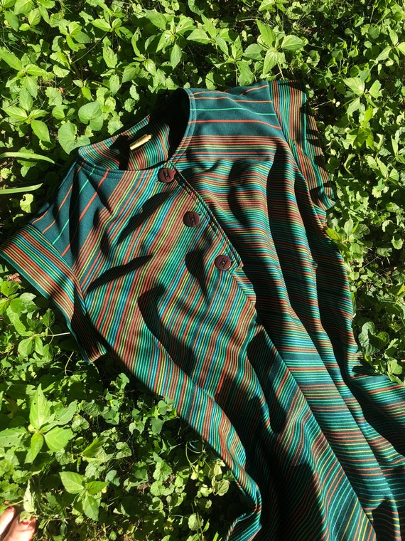1970s does 1930s green chevron dress with deco but