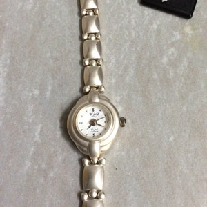 Reloj kish quartz crystal waterproof precio store