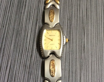 Vintage Rare Women's Oleg Cassini Two Tone Watch Rectangle Gold Dial on Gold Index Hours on Two Tone Linked Band In Mint Un-used Condition!