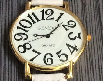 Geneva Women's Round Watch Big Hour Numbers on a White Leather Band New Un-used Vintage Watch, Ready to be Cherished!