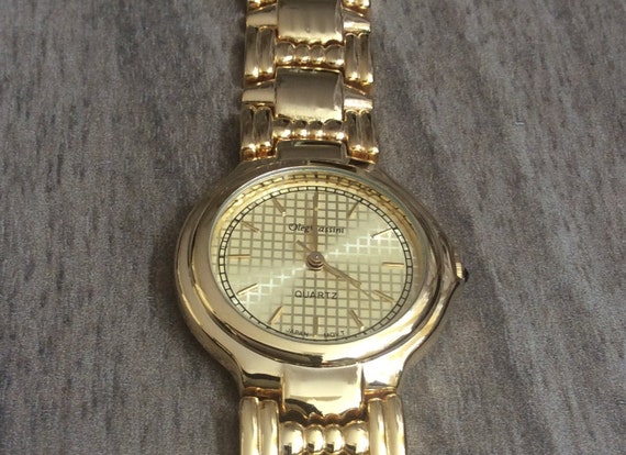 Oleg cassini gold watch sale