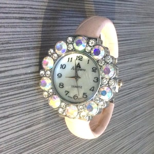Women&#39;s Crystal Bangle Watch on Pink Bangle Band Pearl round Dial Arabic Numeral Hours New Un-used Vintage Watch Rare Find!