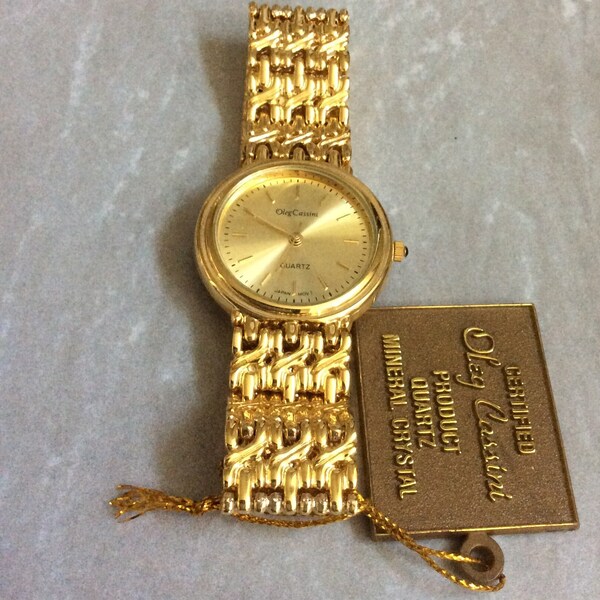 Oleg Cassini Dress Watch Round Gold Dial Index Hour Markers on a Gold Linked Band Vintage Unused New Item Rare Beauty!