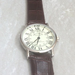 Vellacio Women&#39;s Silver Watch Round Beige Dial 12/24 Roman/Arabic Hours on Brown Leather Band Unused New Vintage Item Works Perfectly!