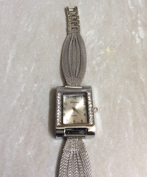 Geneva Womens Crystal Silver Watch Rectangle Silver Dial on Silver Unique Band New Unused Vintage Item Works Perfectly Ready to be Cherished