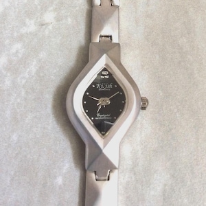 KISH Vintage Silver Watch: Triangular Black Dial, Crystal 12th Hour, Linked Band