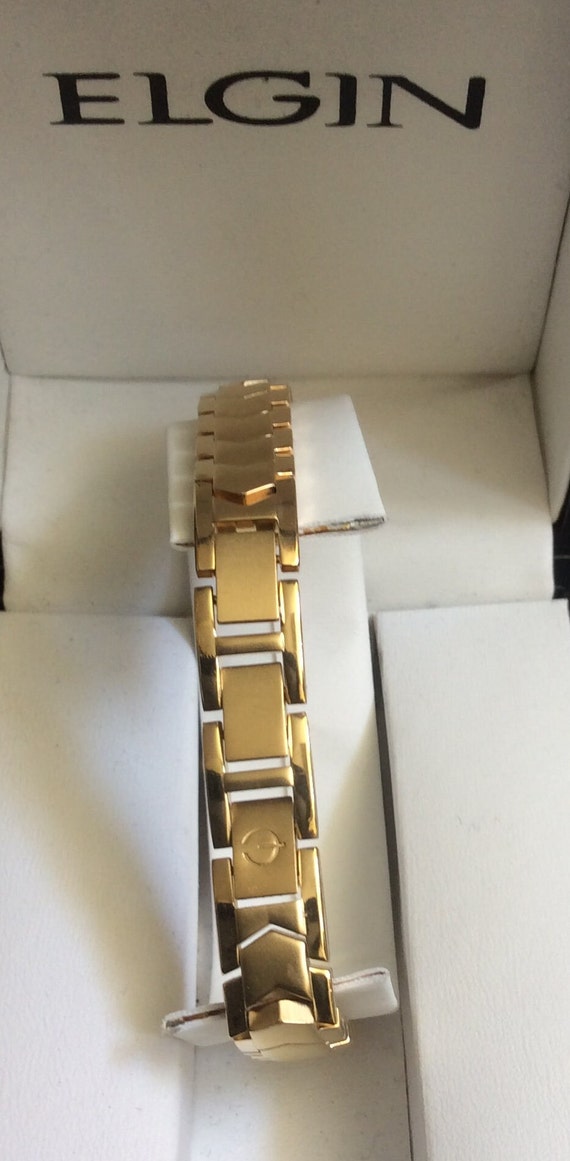 Elgin Women s Round Watch Colorful Abalone Dial on a Gold Linked