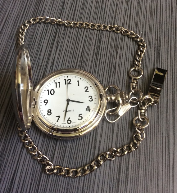 Silver Pocket Watch Round White Dial Black Numbered Hours on a