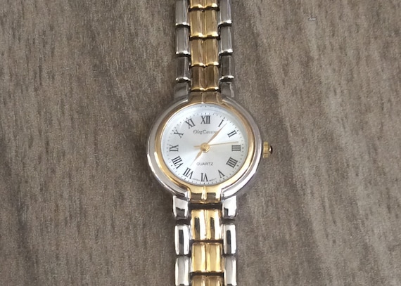 Small gold and silver watch best sale