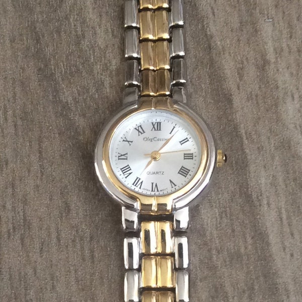 Oleg Cassini Women's Watch Small Silver Round Dial with Roman Numeral Hours on a Two-Tone Linked Band Vintage In Mint Condition Watch Beauty