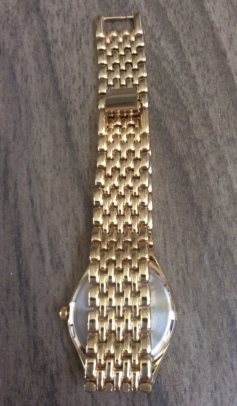 oleg cassini watch value