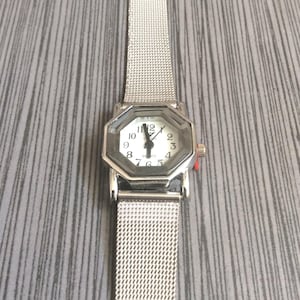 Geneva Women&#39;s Octagon Watch White Dial Arabic Hours on a Silver Mesh Strap Band New Un-used Vintage Item!
