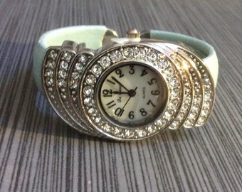 Women's Silver Crystal Bangle Watch Round Pearl Dial Black Arabic Hours on a Light Blue Bangle Band, New Un-used Vintage Watch!