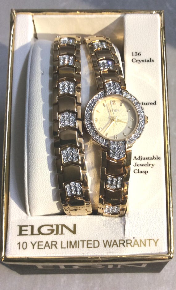 ELGIN Women's Gold 136 Crystals Watch Round Gold Dial on Crystal