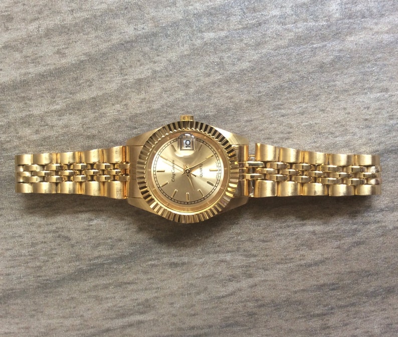 oleg cassini watch value