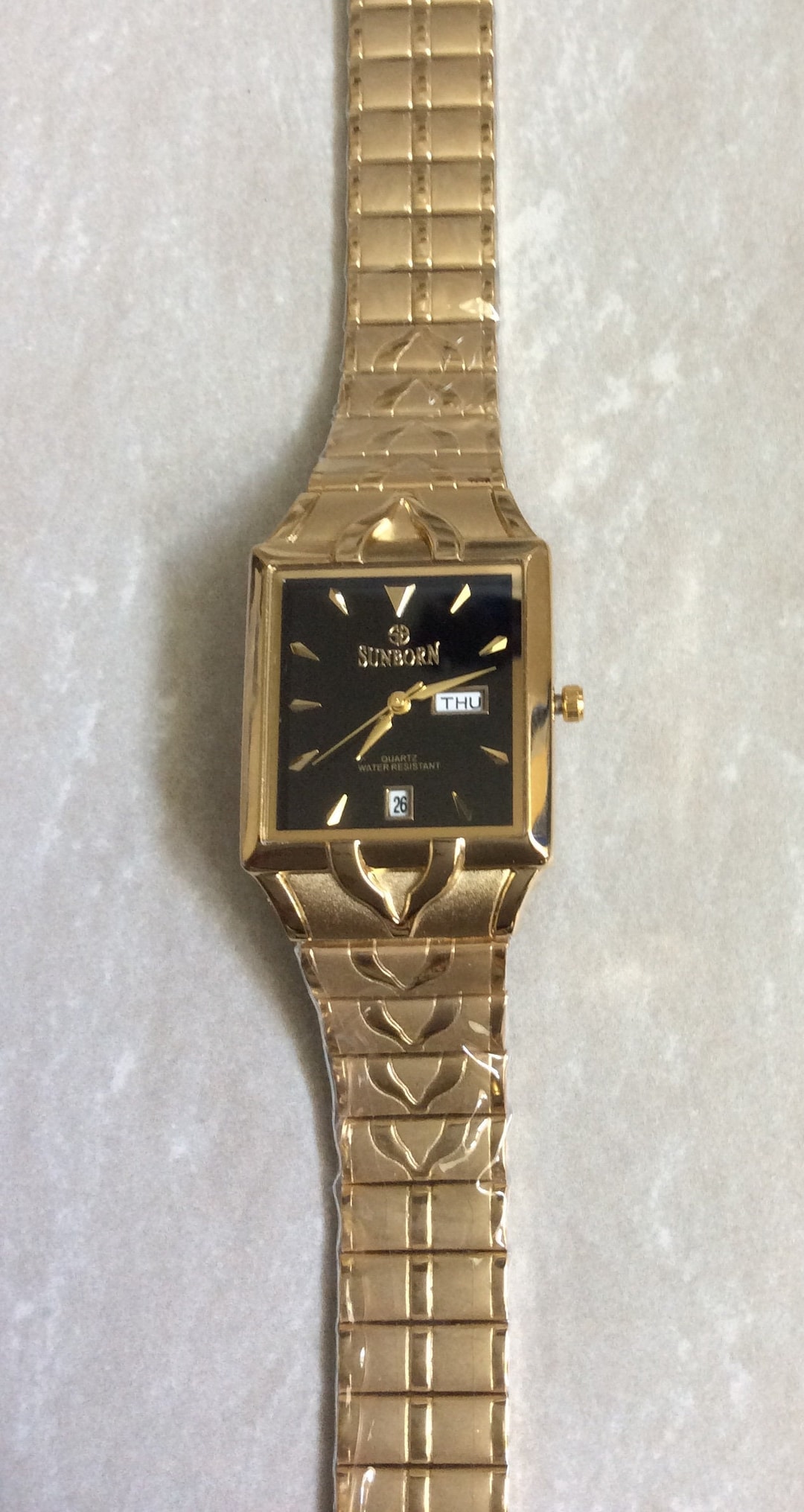 Sunborn watch hotsell 23k gold plated