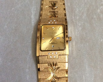 Reloj de vestir dorado para hombre SUNBORN, esfera rectangular dorada, indicadores de día y fecha en correa de oro grabada, reloj vintage nuevo sin usar. ¡Bonito regalo!