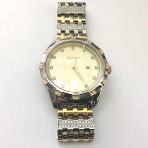 Reloj Elgin para hombre, esfera redonda dorada, indicador de fecha y hora con cristal, correa bicolor de eslabones, nuevo en caja. ¡Un precioso reloj de vestir vintage!