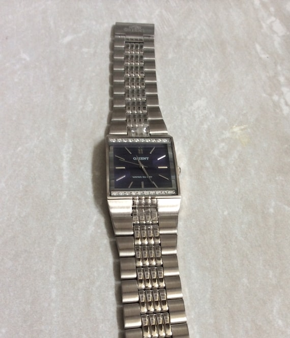 ORIENT Men s Silver Watch Square Blue Dial Crystal Bezel on Silver Link Band a New Unused Vintage Item Awesome Watch