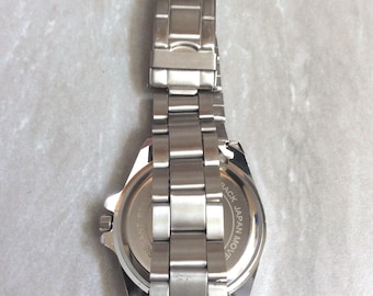 【中古】 Into Blue Riverwatching Land’s End Closer to Geneva Geneva Men's Silver Watch Round Blue Dial Blue Seconds