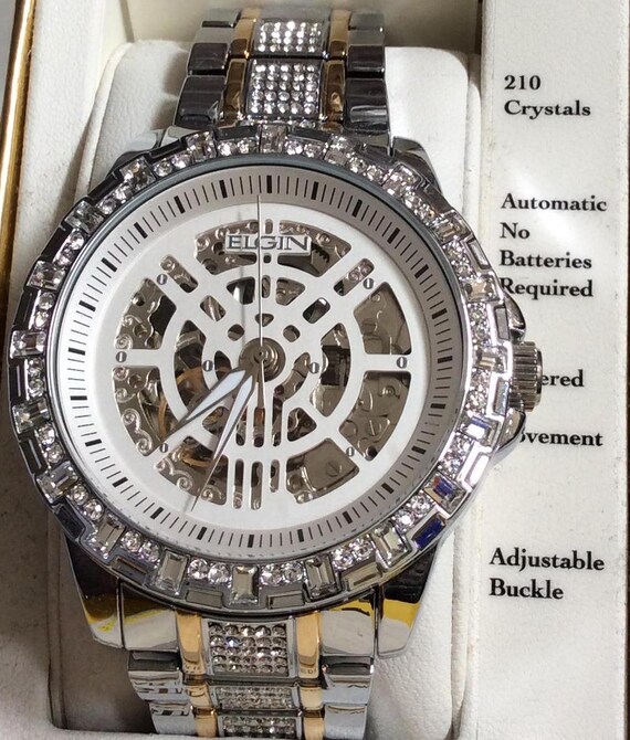 Reloj ELGIN AUTOMATICO sin pilas para hombre esfera plateada 210 cristales en correa de dos tonos enlazada con hebilla ajustable. Reloj vintage