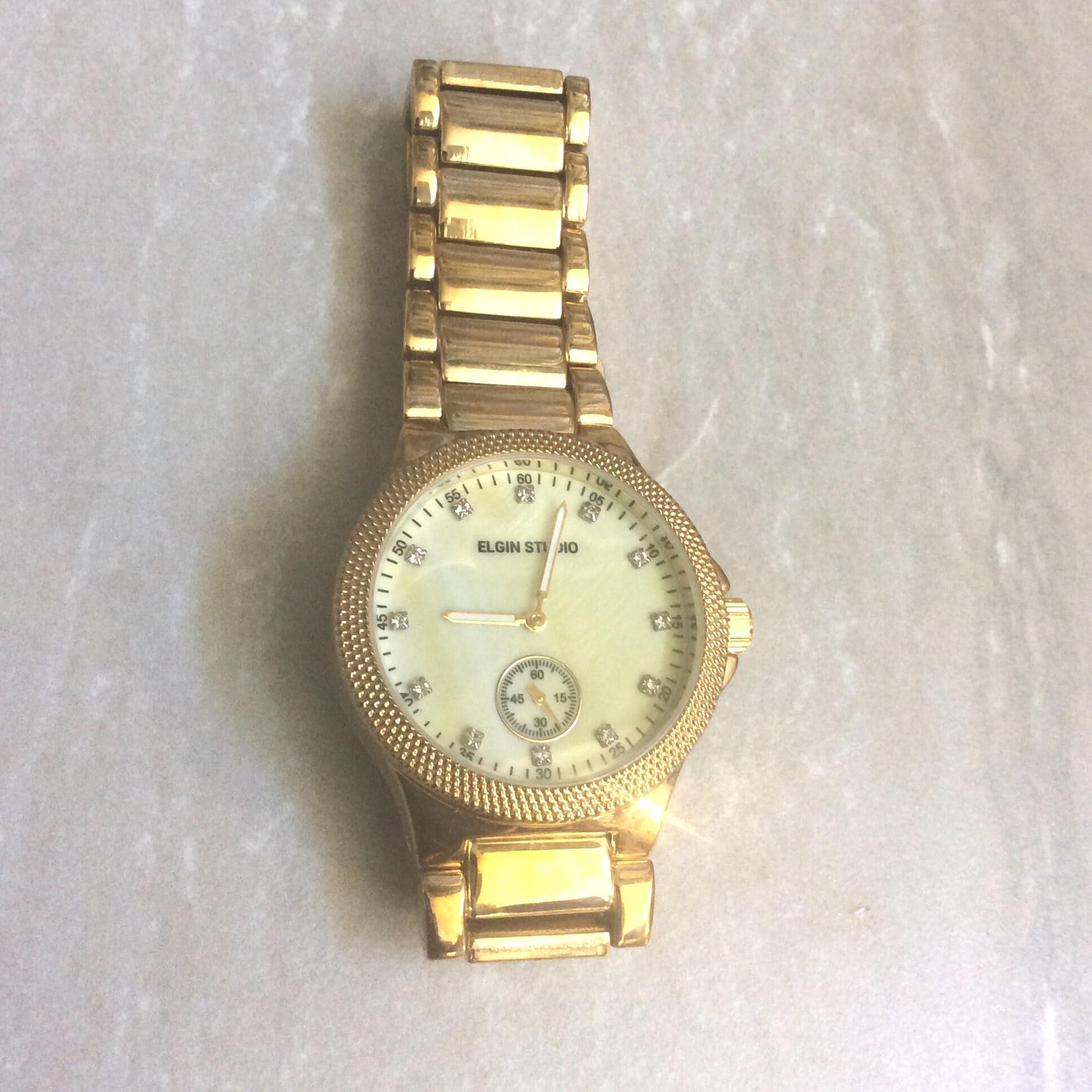 Reloj ELGIN STUDIO dorado para hombre, esfera redonda con nácar